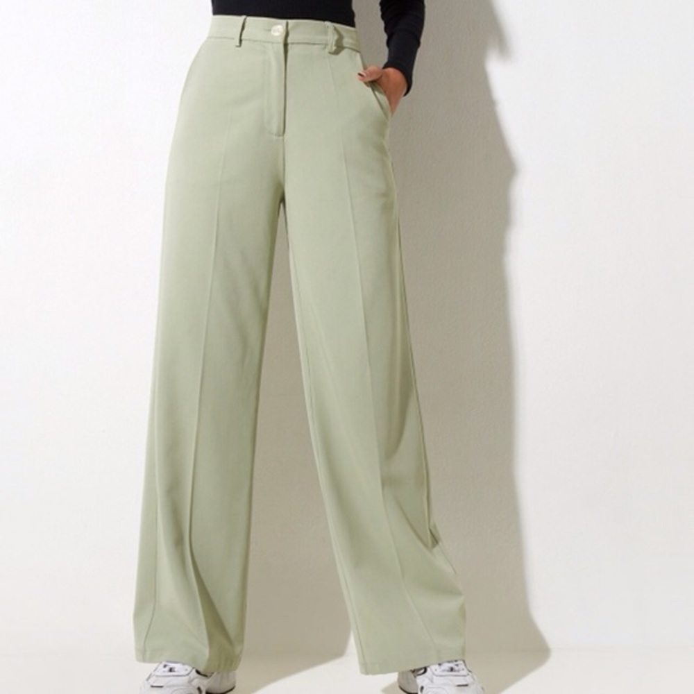 Sage green trousers from Motel Rocks, size medium
